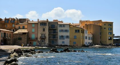 Picturesque waterfront buildings in Saint-Tropez, capturing Mediterranean charm.